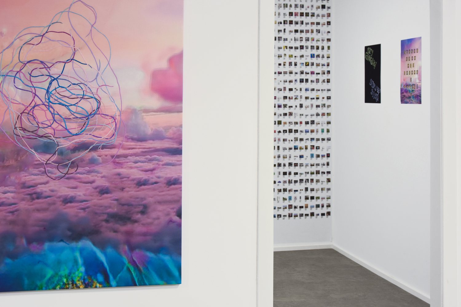AUTOMATIC DREAMS — a cloud painting in the corner, standing text panels beside it