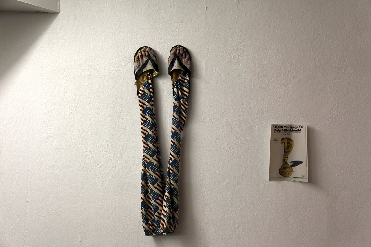 LSDSL — a striped object on the gallery wall
