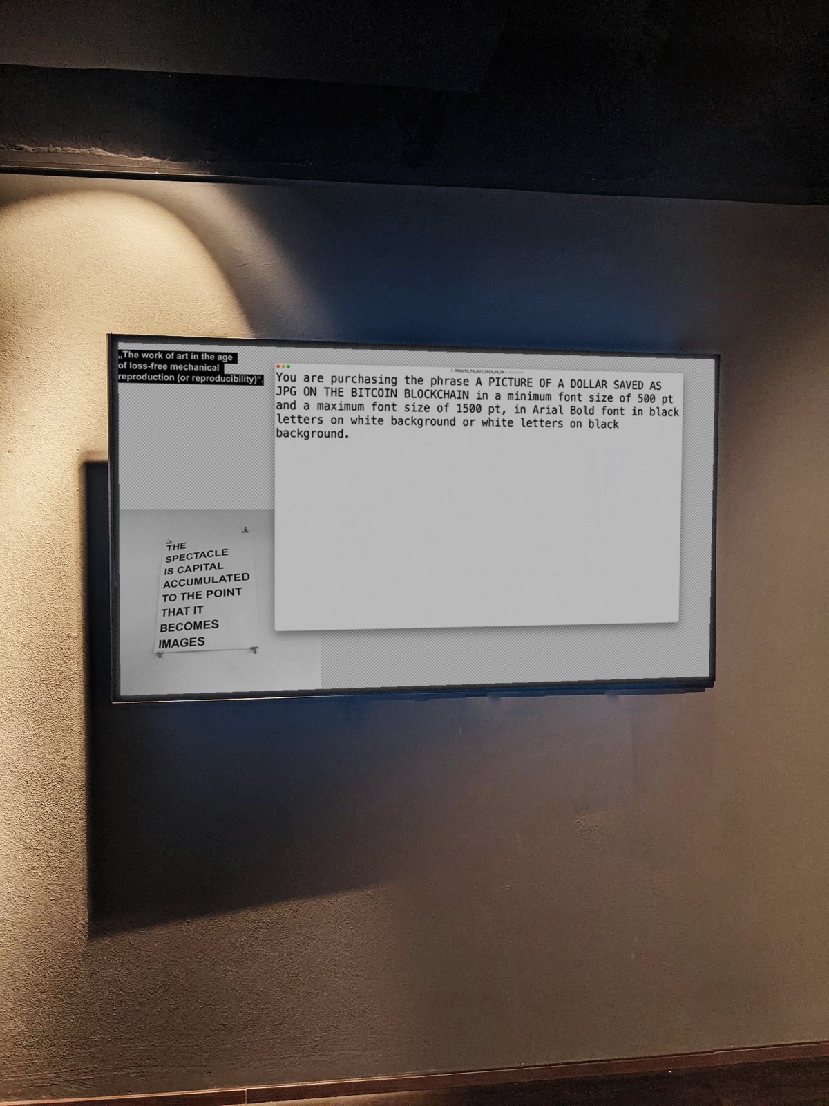 TRIBUTE TO GUY — the two placards in detail: the purchase definition and the Debord line