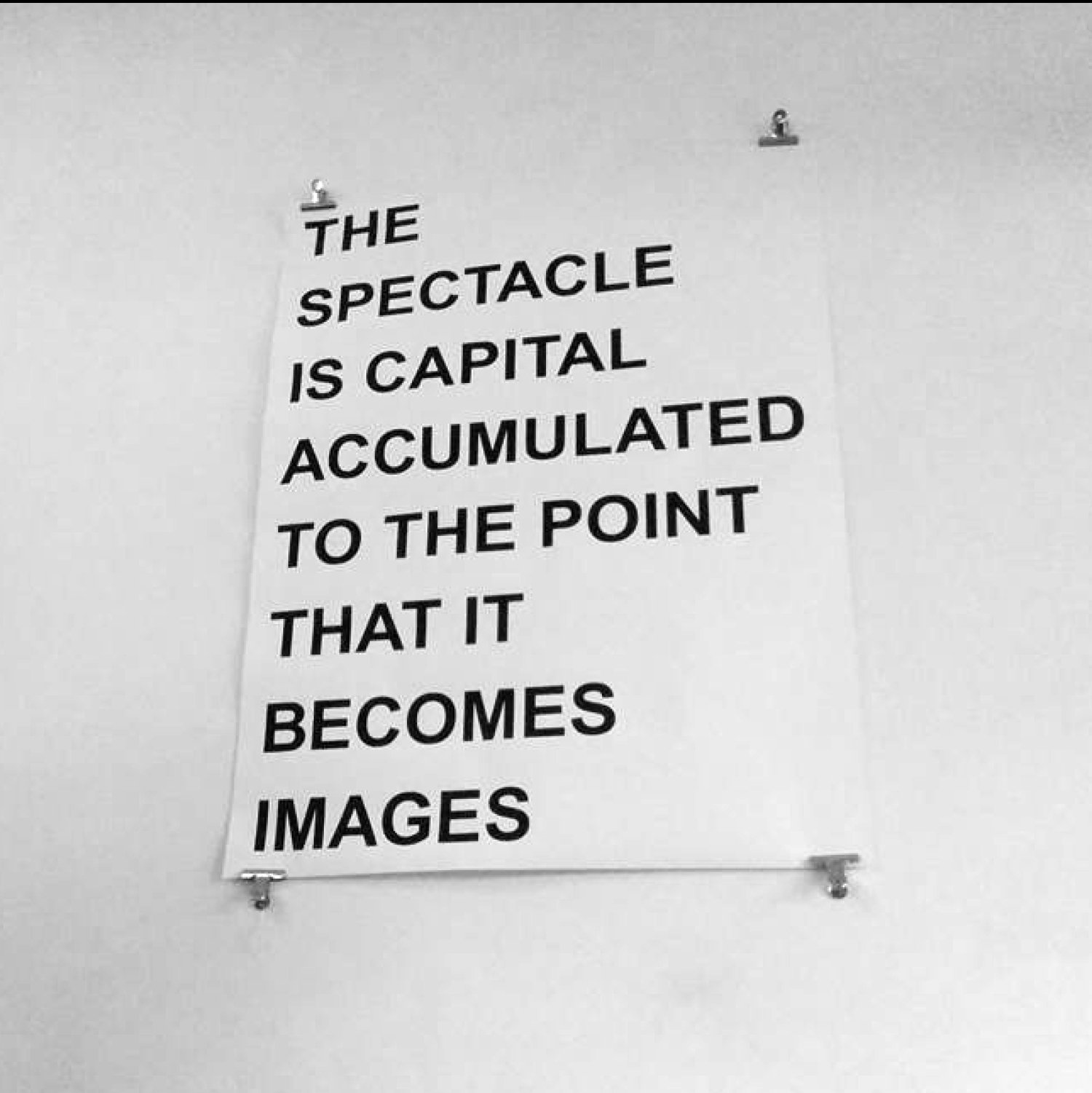 Placard: the spectacle is capital accumulated to the point that it becomes images